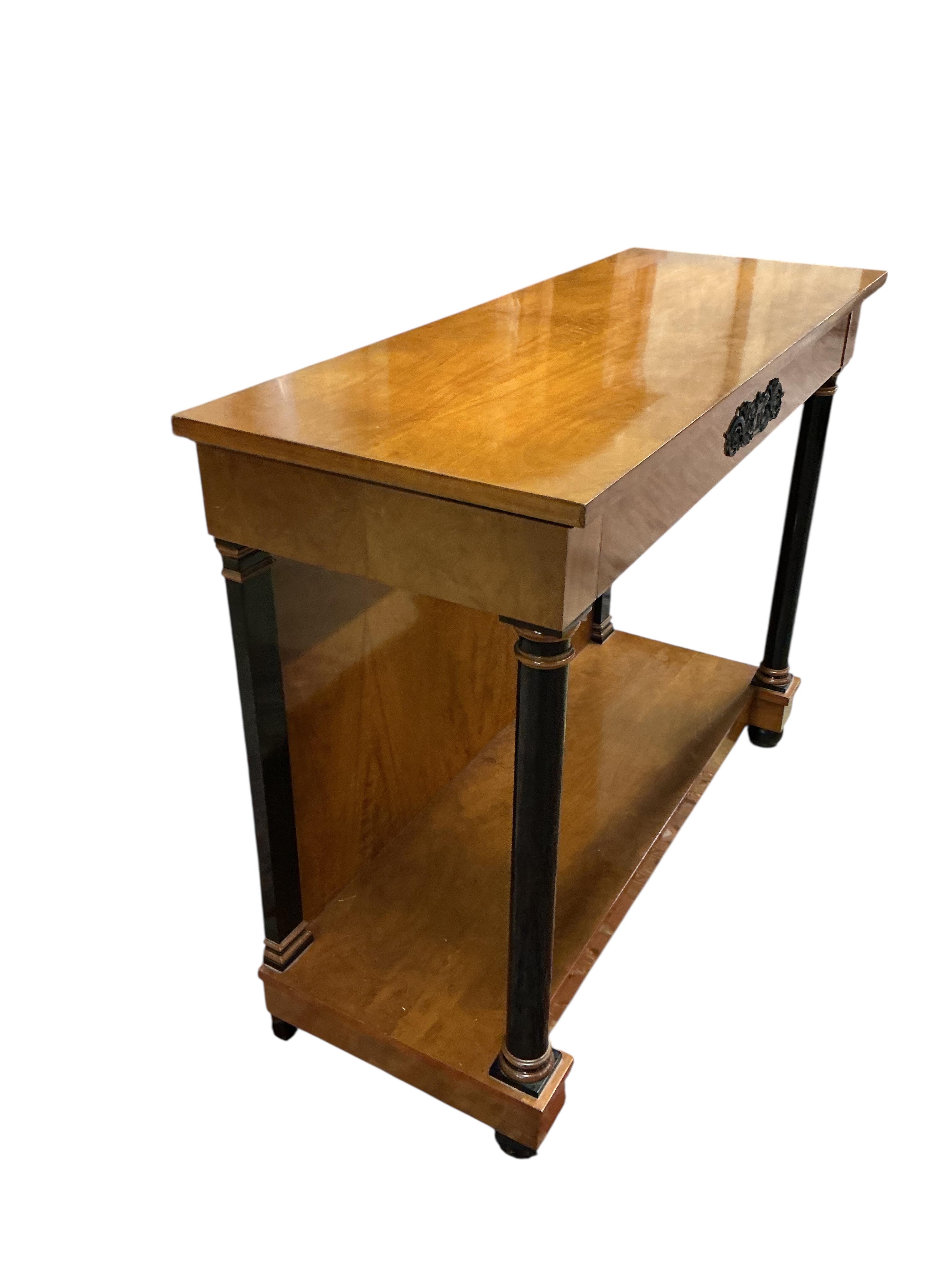 A pair of Biedermeier style cherry two tier console tables, with frieze drawers, width 110cm, depth 42cm, height 86cm